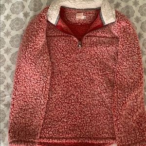 red fuzzy sweatshirt